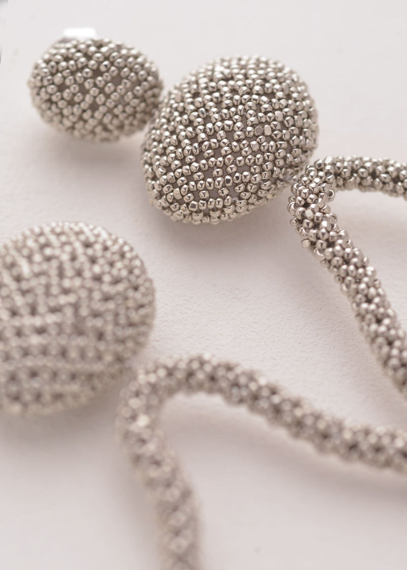 ARETES HAUTE TAWARI PLATINO