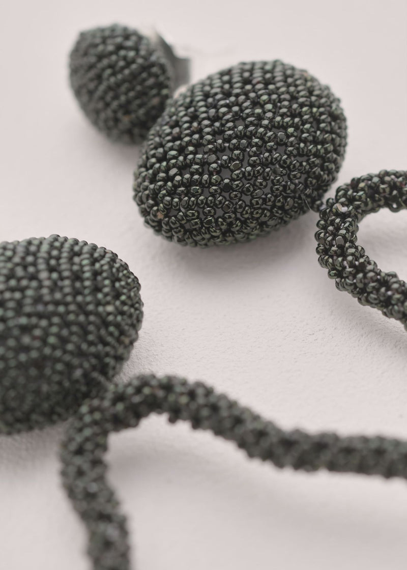 ARETES HAUTE TAWARI VERDE PETROLEO