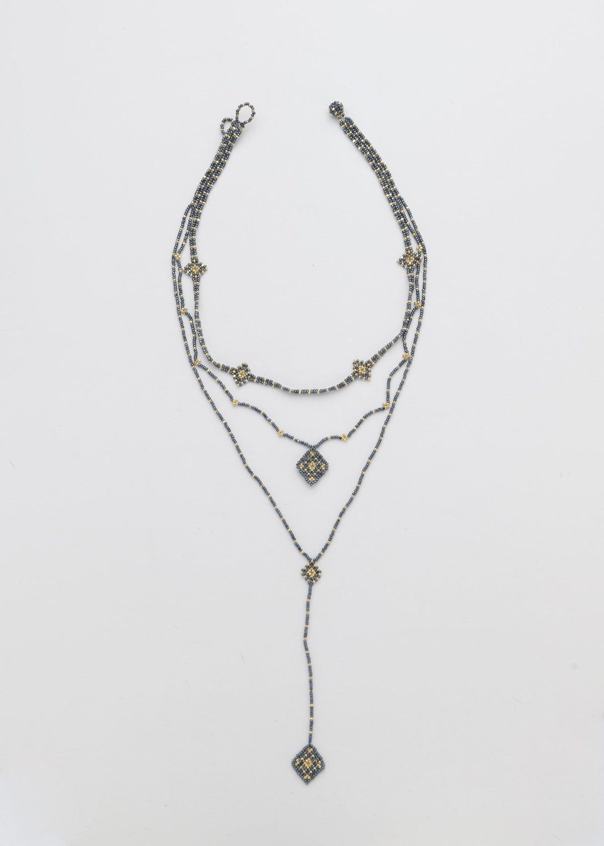 COLLAR WIXA LINEAL ORO GRIS METALICO
