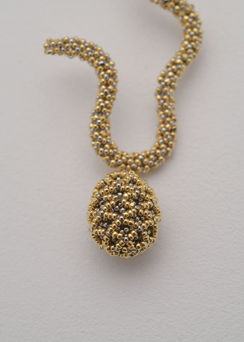 ARETES IRREGULARES TAWARI ORO PLATINO