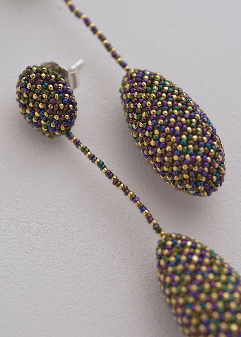 ARETES COLGANTES TAWARI ORO TORNASOL