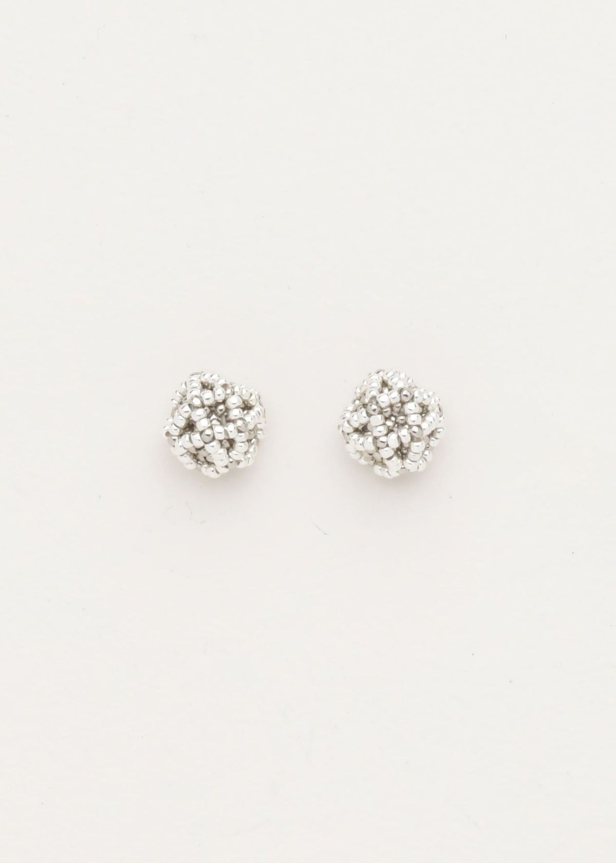 BROQUELES NAWI PLATA PLATINO