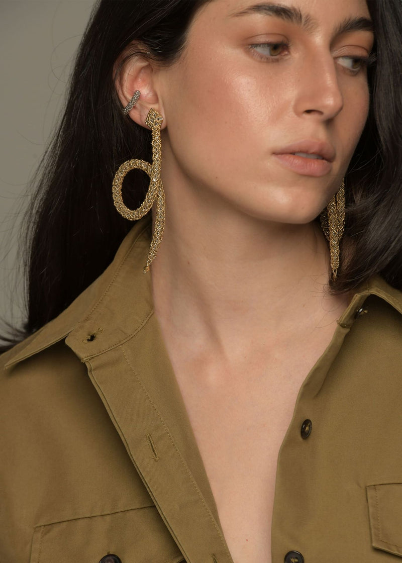 ARETES SERPIENTE LOOP NAWI ORO PLATINO