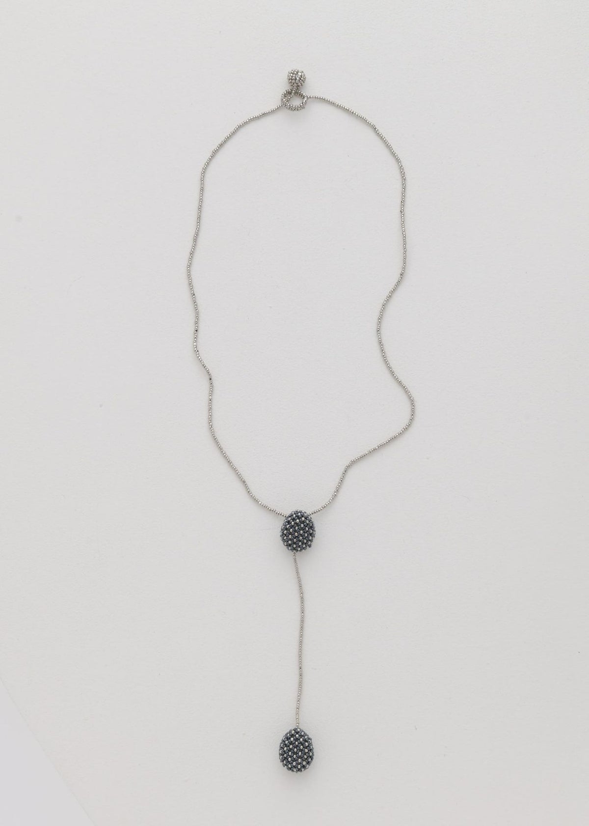 COLLAR DOS TAWARI PLATINO GRIS METALICO