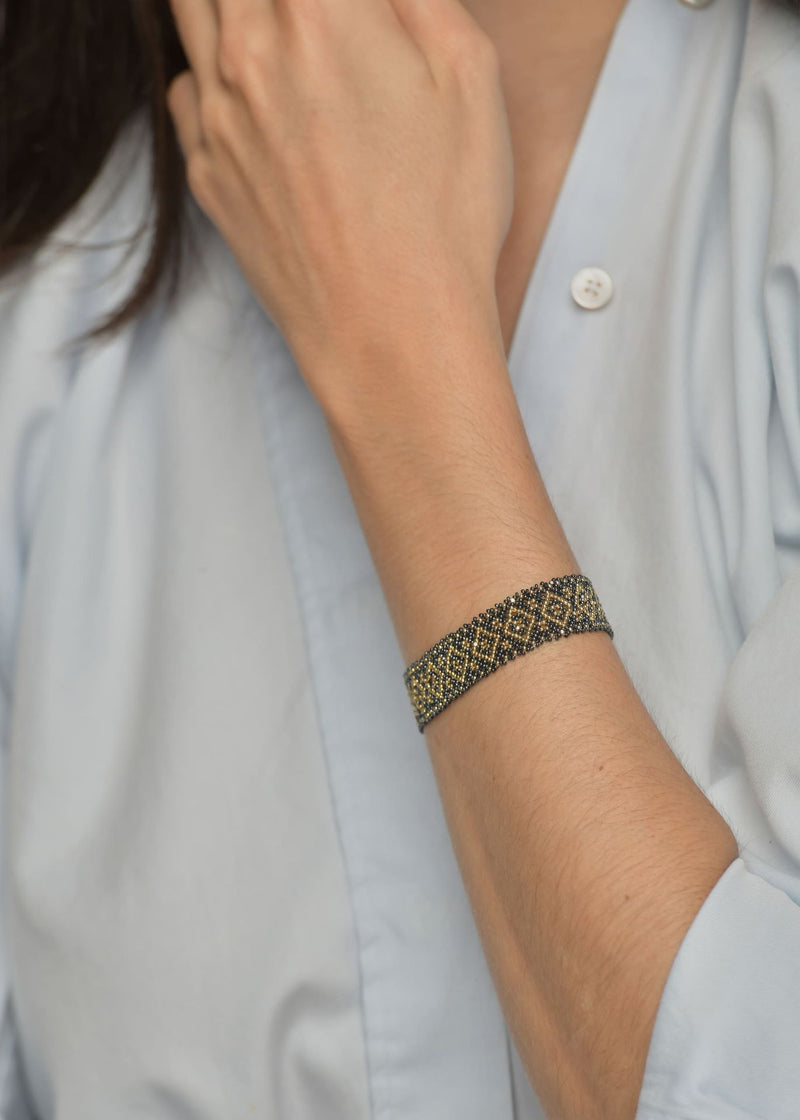 BRAZALETE HUTA MARTHA ORO GRIS METALICO