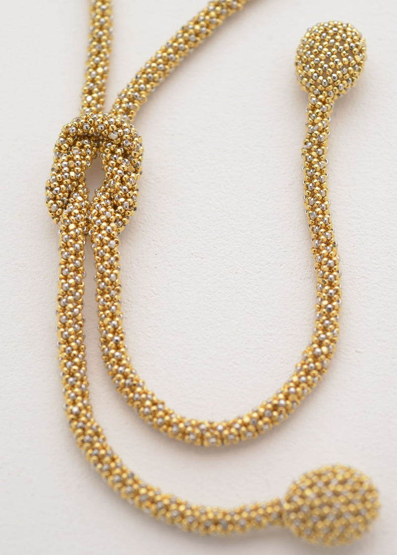COLLAR NUDO TAWARI ORO PLATINO