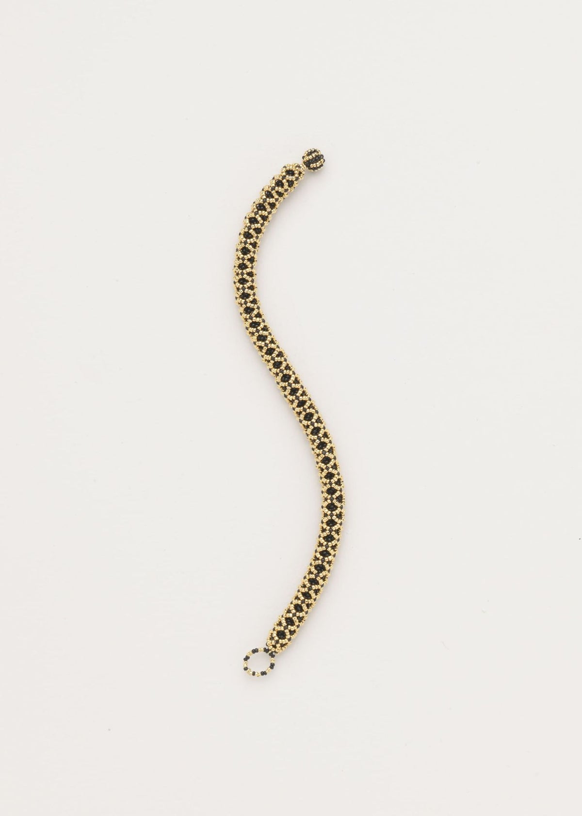 BRAZALETE HUTA SERPIENTE NAWI ORO NEGRO