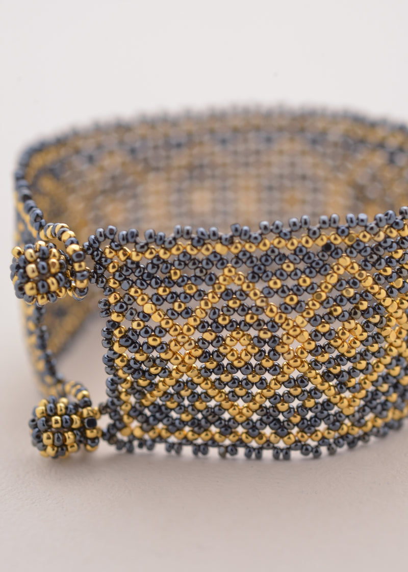 BRAZALETE MARTHA ORO GRIS METALICO