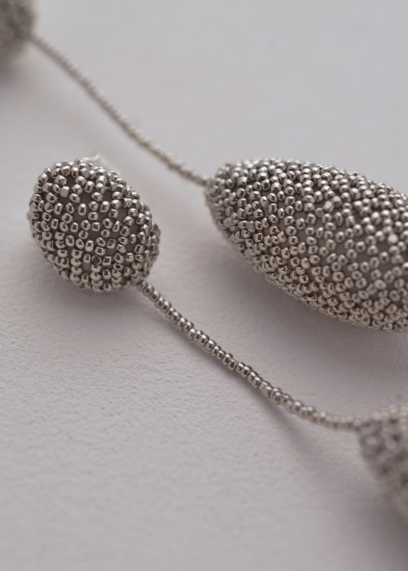 ARETES COLGANTES TAWARI PLATINO