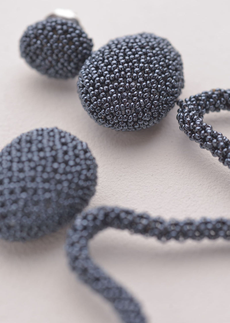 ARETES HAUTE TAWARI GRIS METALICO