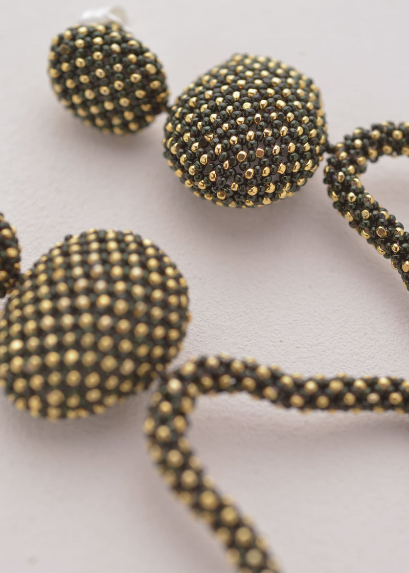 ARETES HAUTE TAWARI ORO NEGRO