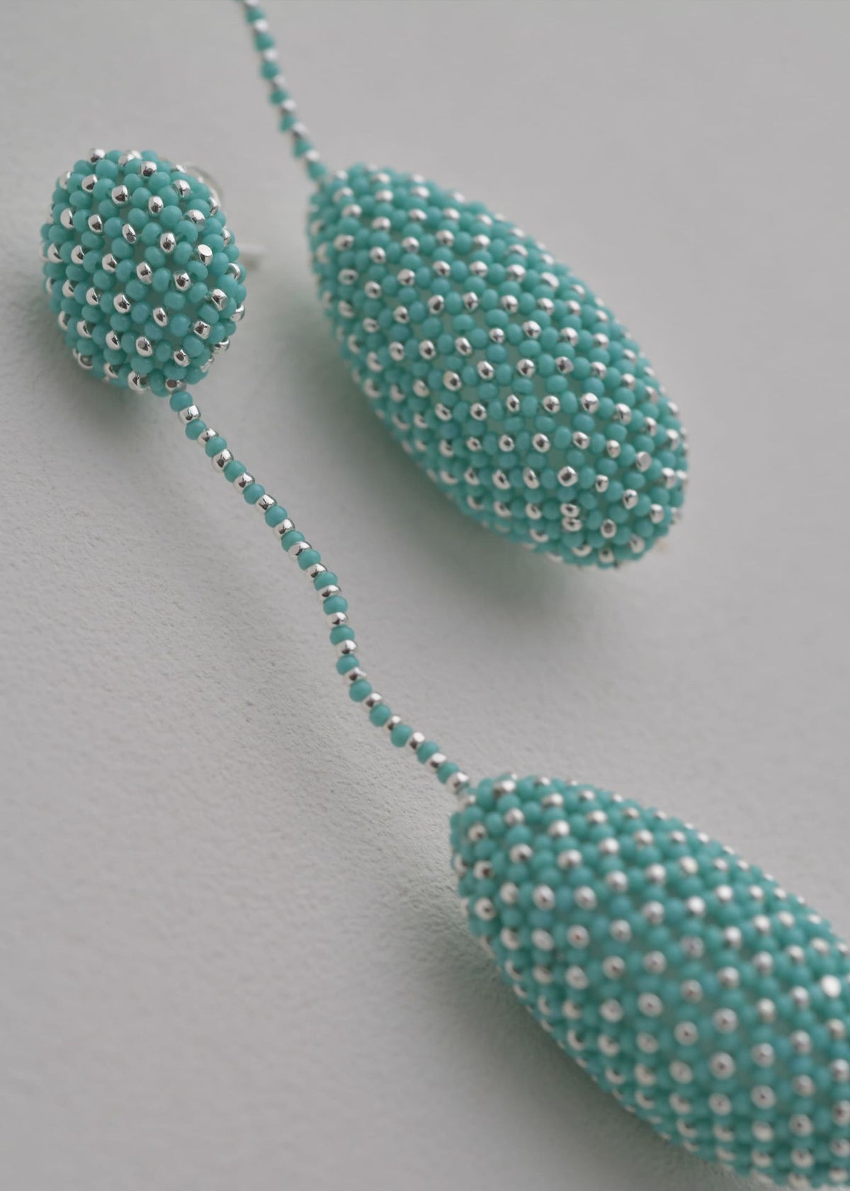 ARETES COLGANTES TAWARI PLATA AZUL TURQUESA