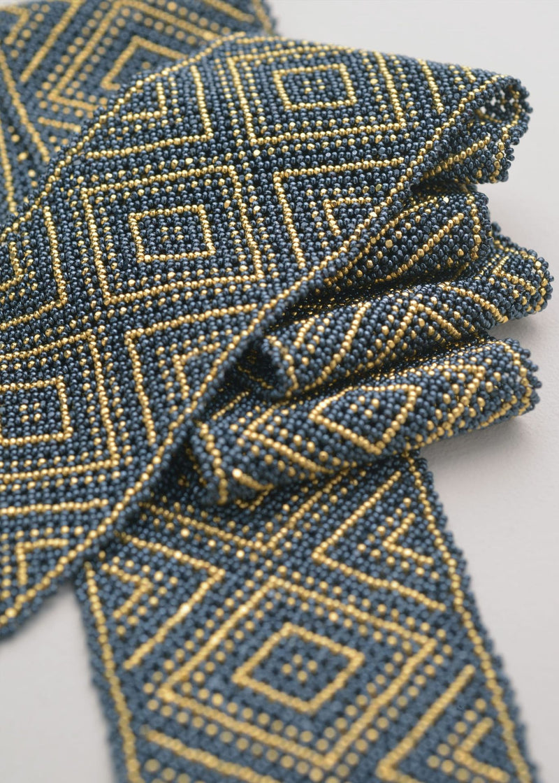 PAÑOLETA ORO GRIS METALICO