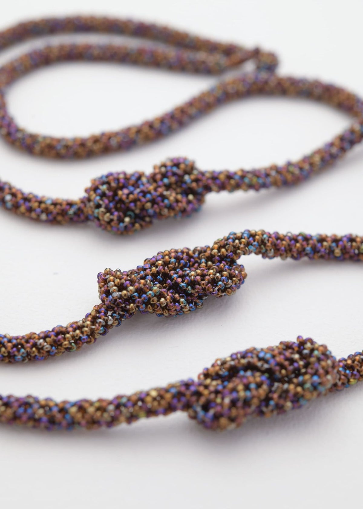 COLLAR TRES HAIKURI TOPAZ TORNASOL