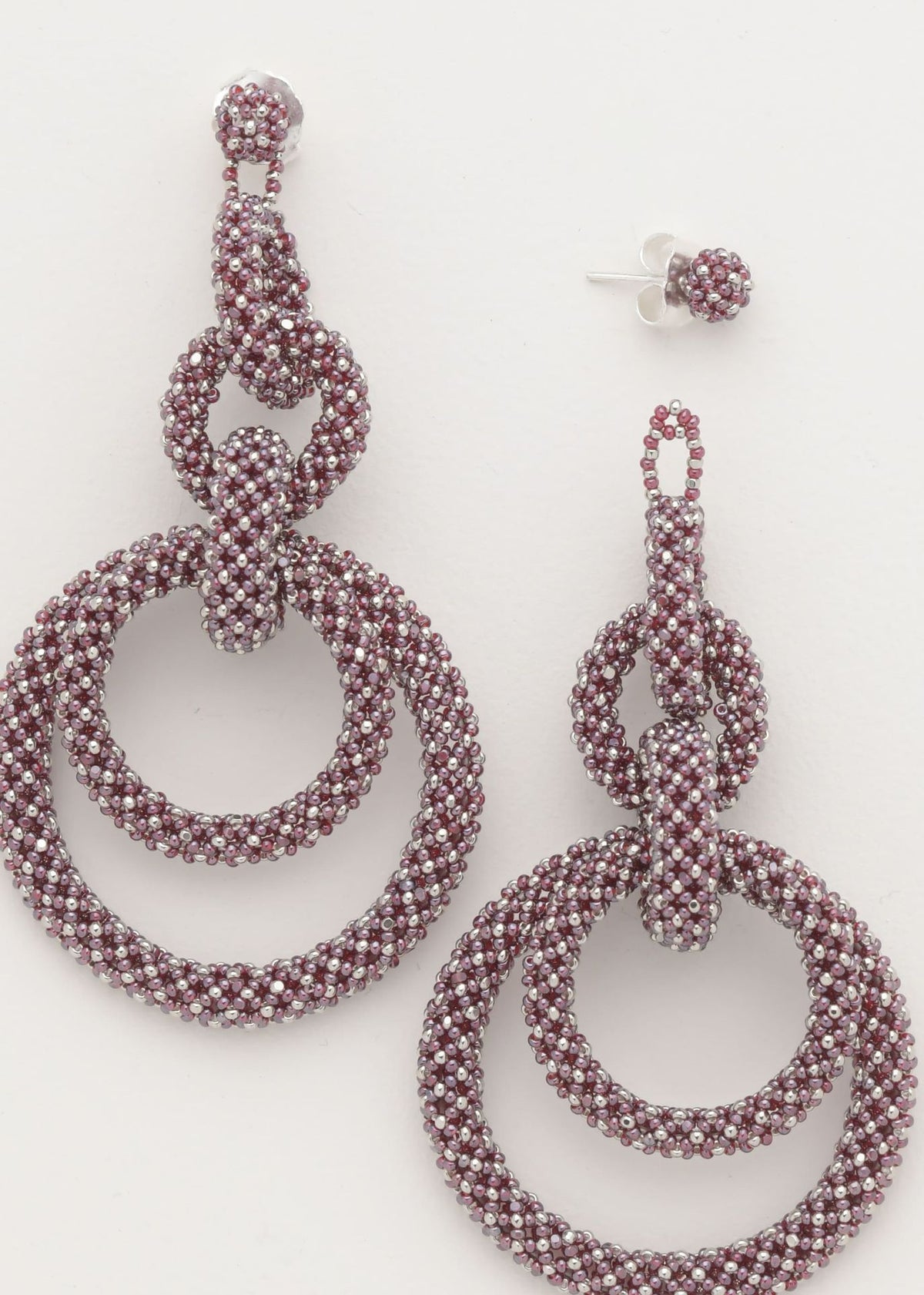 ARETES CINCO AROS CADENA PLATINO TG GARNET LUSTRE