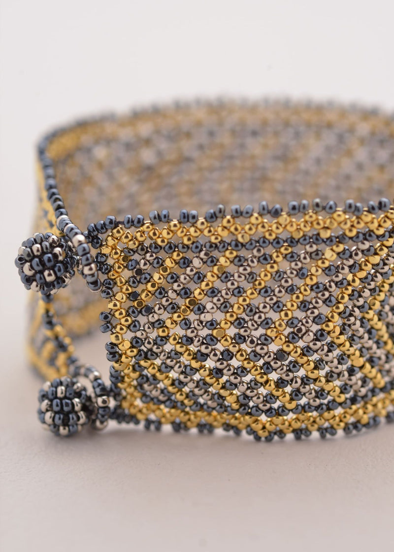 BRAZALETE MARTHA ORO PLATINO GRIS METALICO