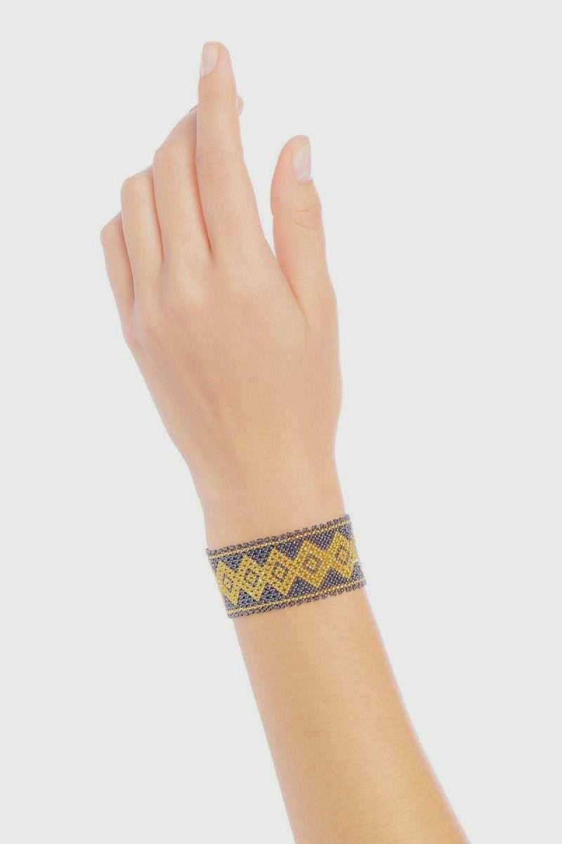 BRAZALETE MARTHA ORO GRIS METALICO