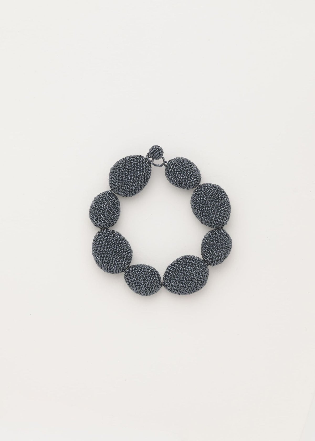 BRAZALETE TAWARI GRIS METALICO