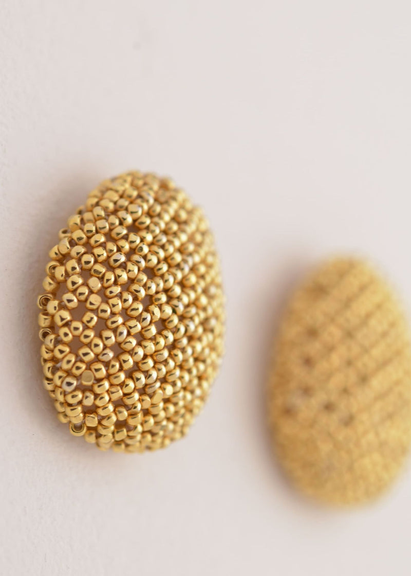 BROQUELES TAWARI ORO