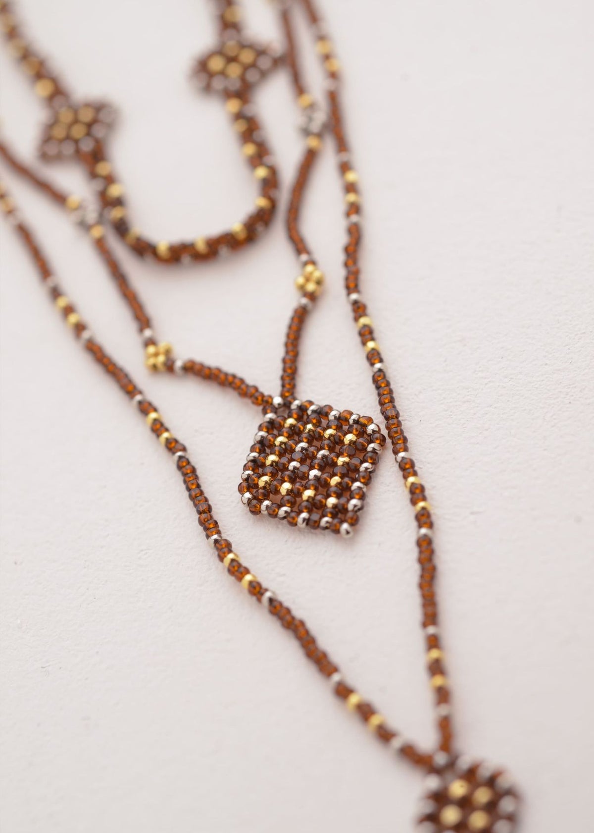 COLLAR WIXA LINEAL ORO PLATINO CAFE TRANSPARENTE