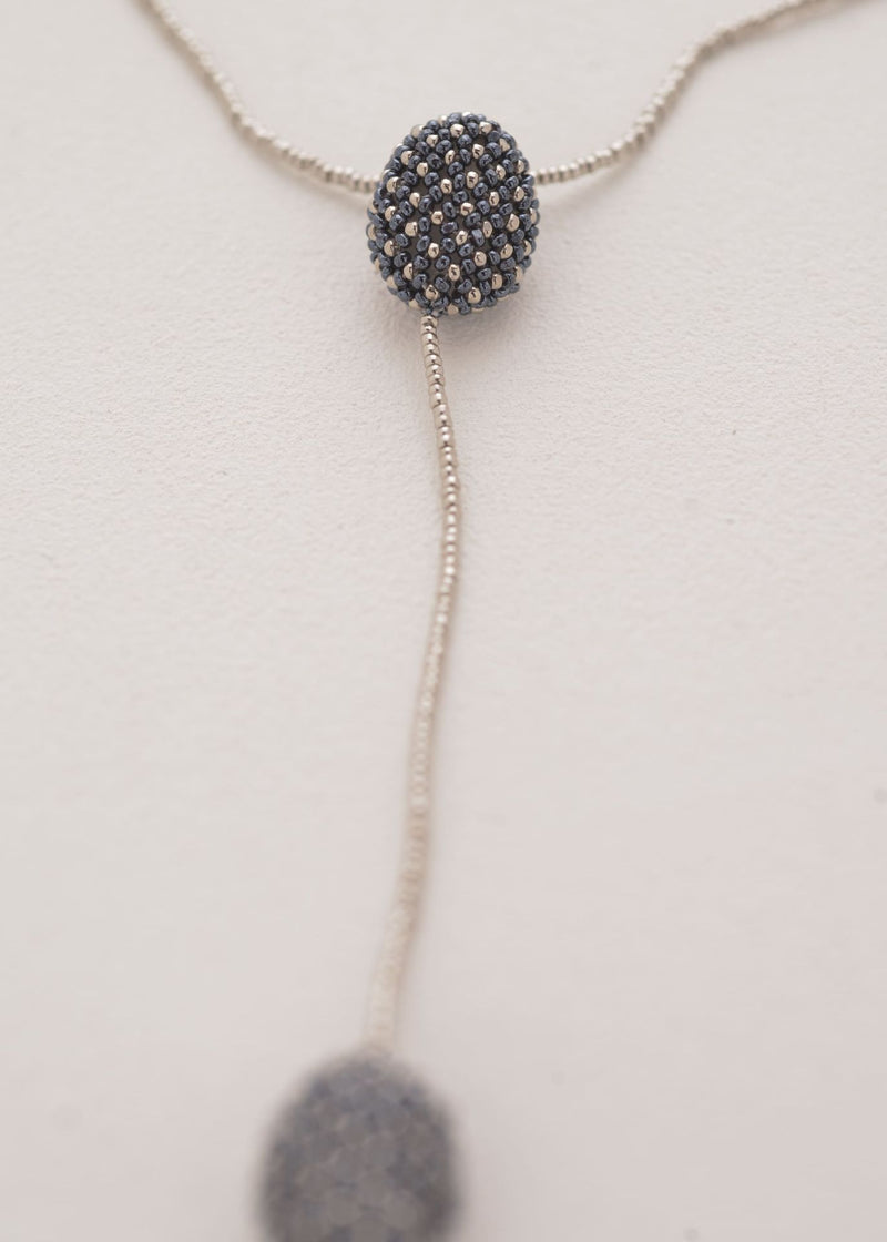 COLLAR DOS TAWARI PLATINO GRIS METALICO