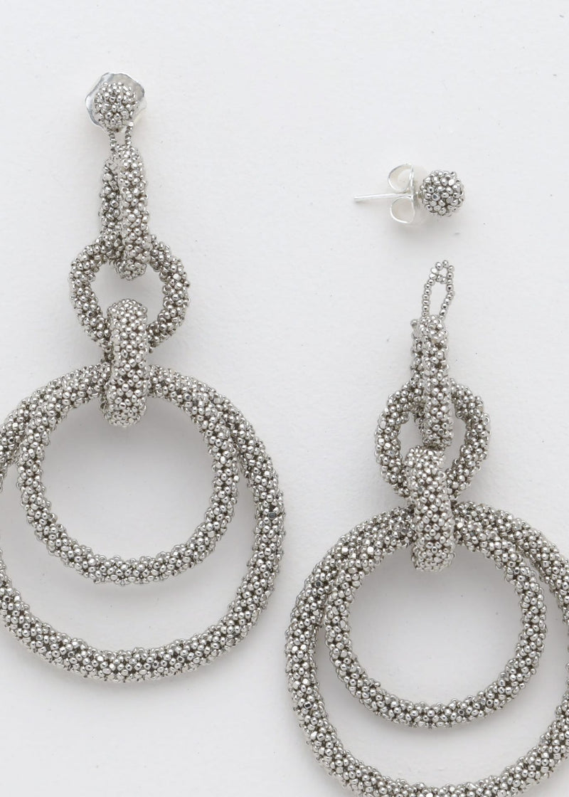 ARETES CINCO AROS CADENA PLATINO