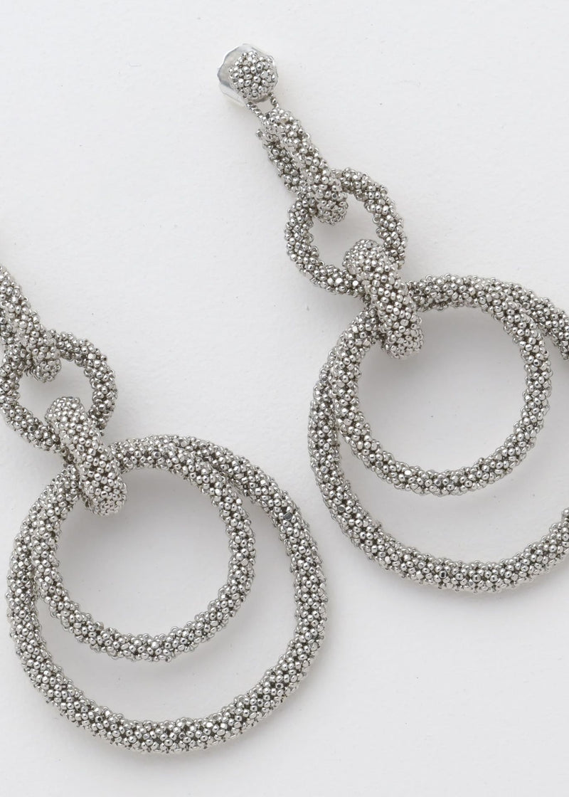ARETES CINCO AROS CADENA PLATINO