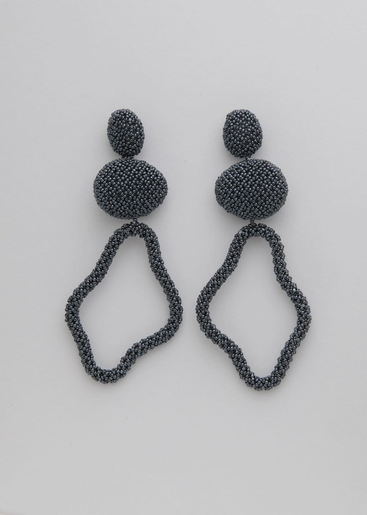 ARETES HAUTE TAWARI GRIS METALICO