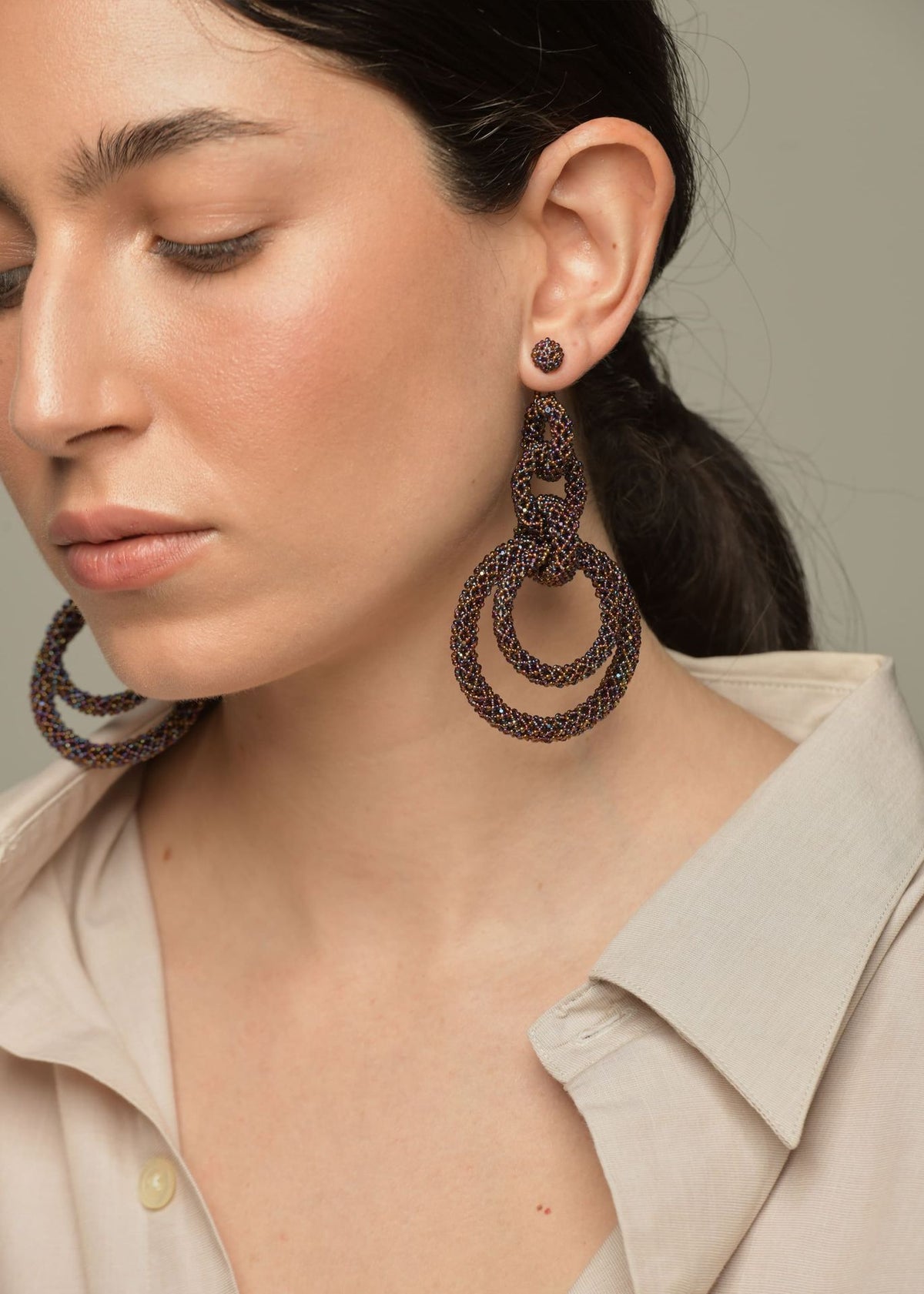 ARETES CINCO AROS CADENA TOPAZ TORNASOL