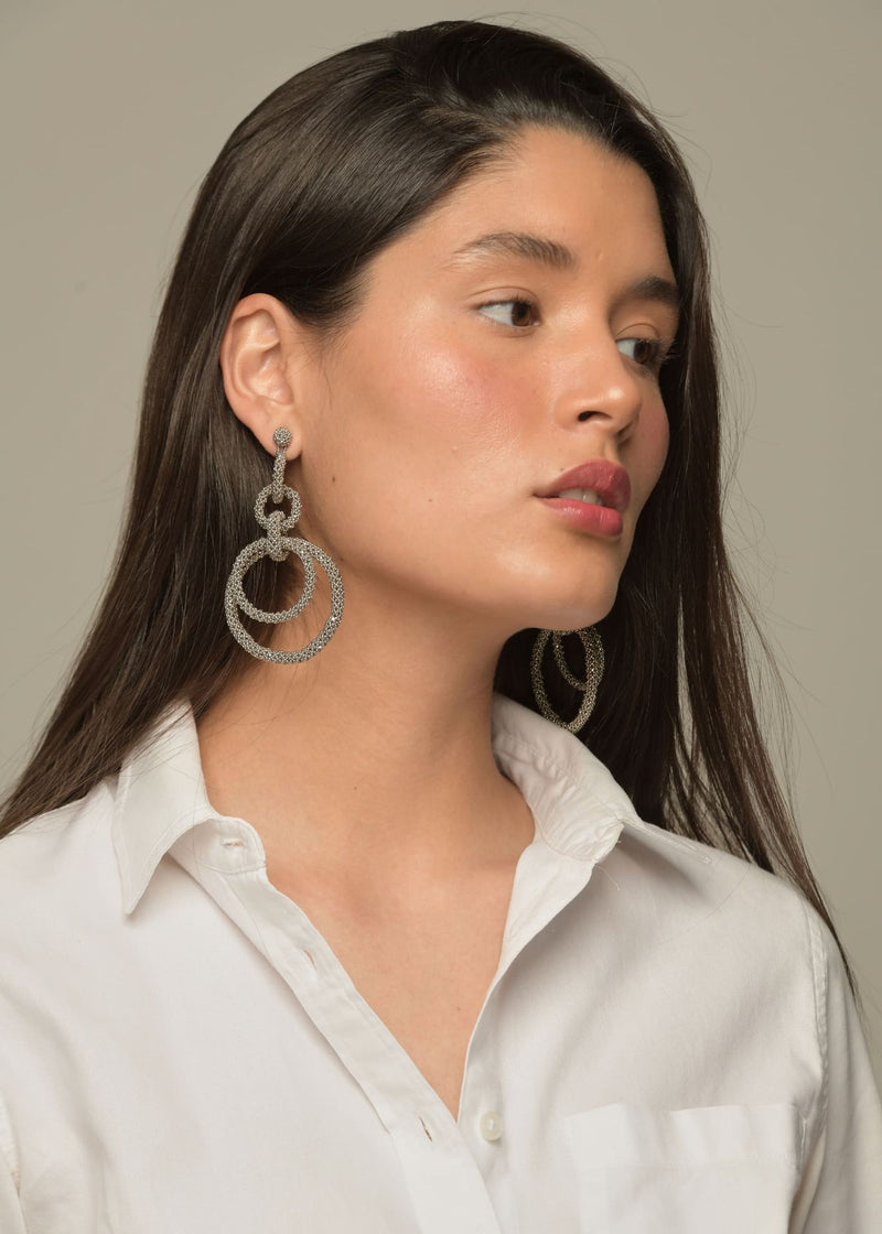 ARETES CINCO AROS CADENA PLATINO
