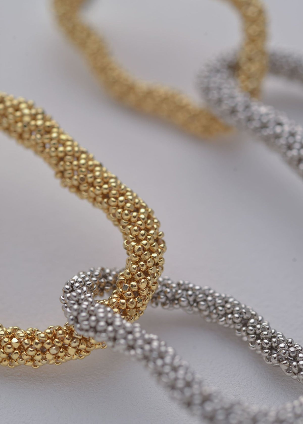 ARETES ESLABON KIPURI ORO PLATINO