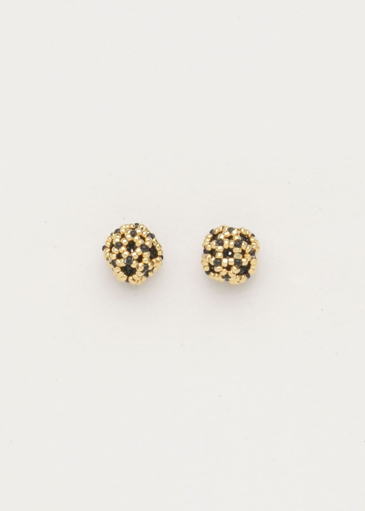 BROQUELES NAWI ORO NEGRO