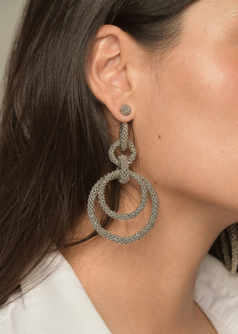 ARETES CINCO AROS CADENA PLATINO