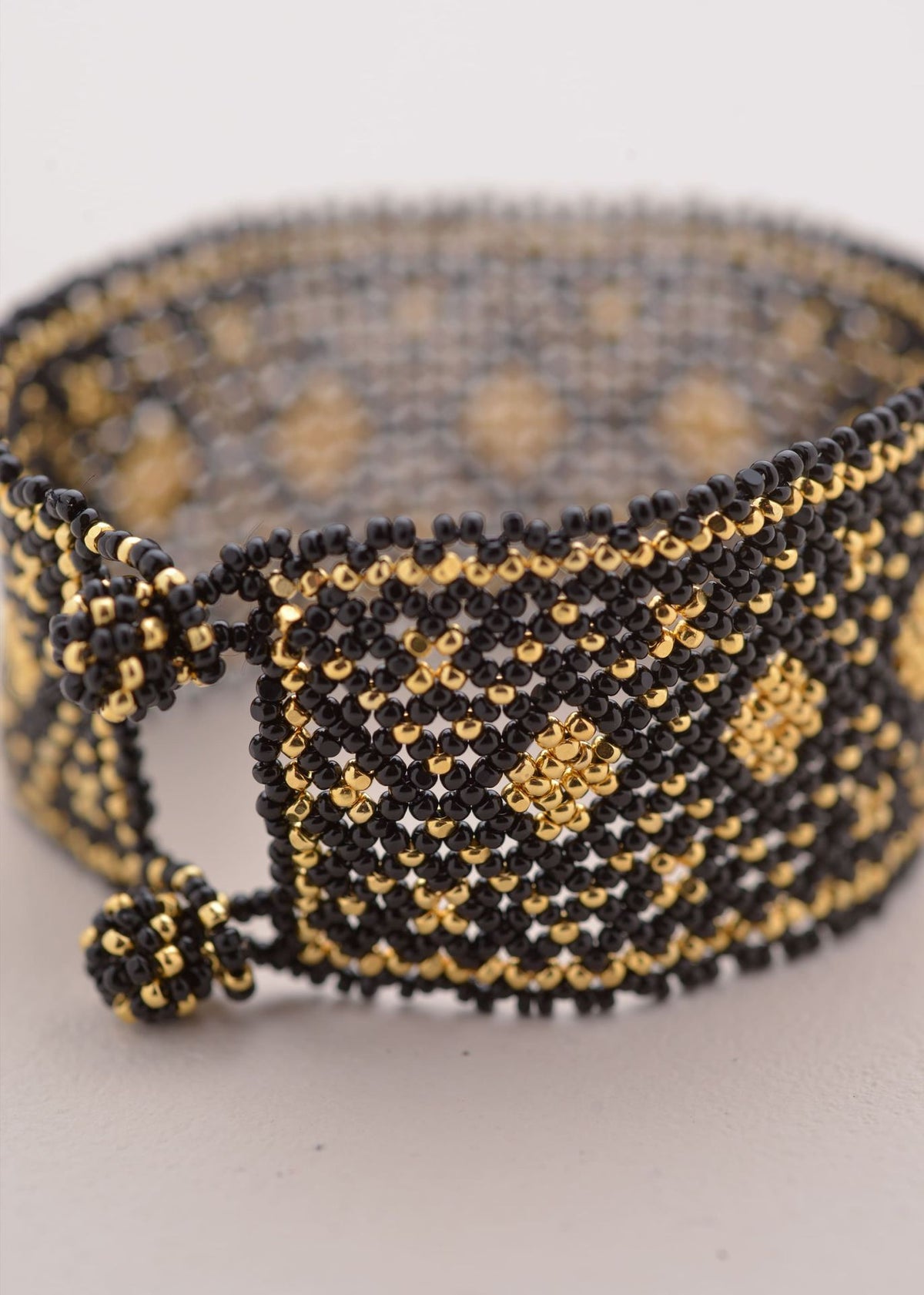BRAZALETE MARTHA ORO NEGRO