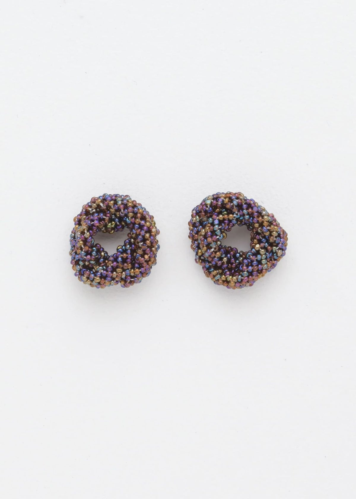 BROQUELES HAIKURI TOPAZ MORADO TORNASOL