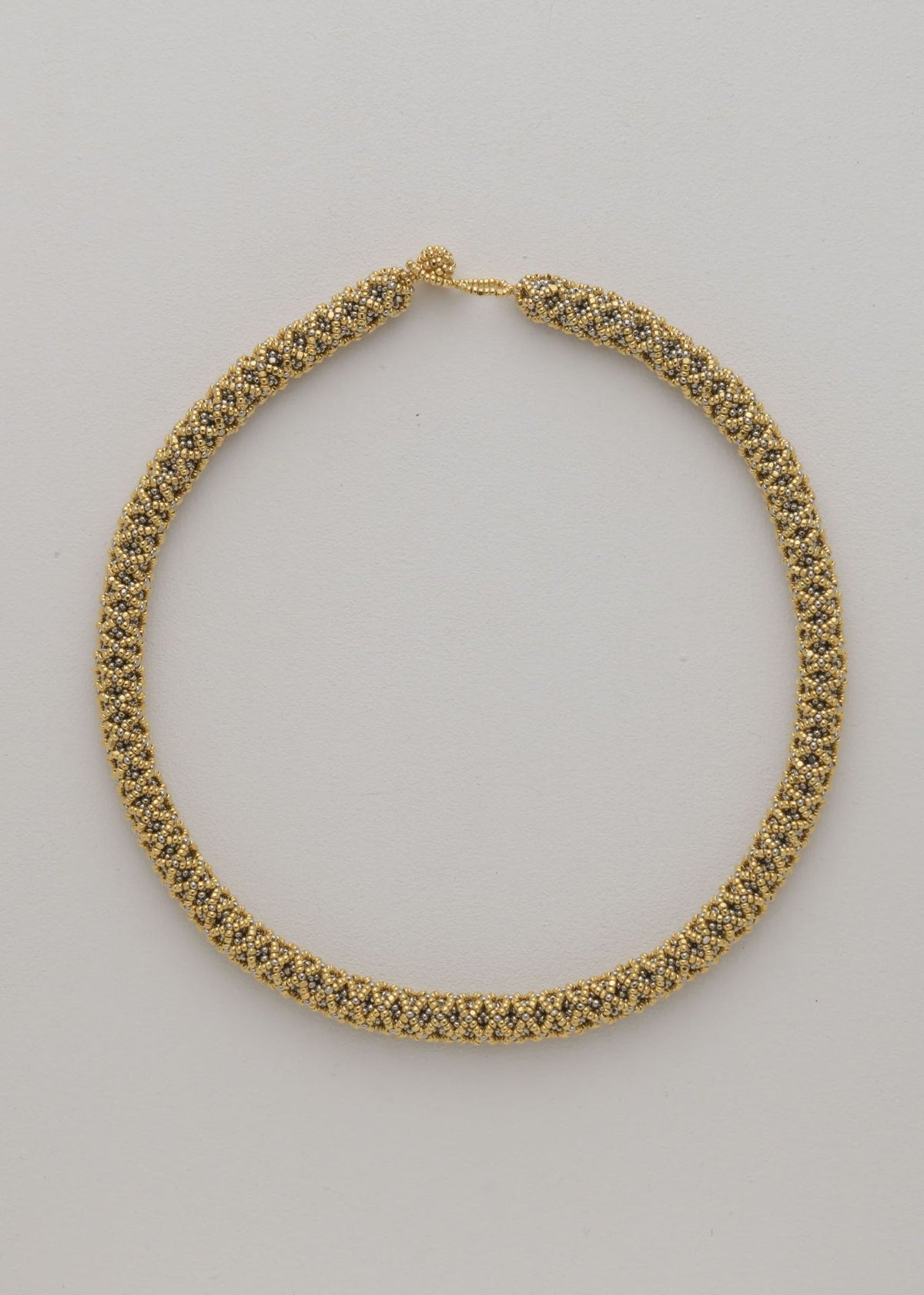 GARGANTILLA NAWI ORO PLATINO