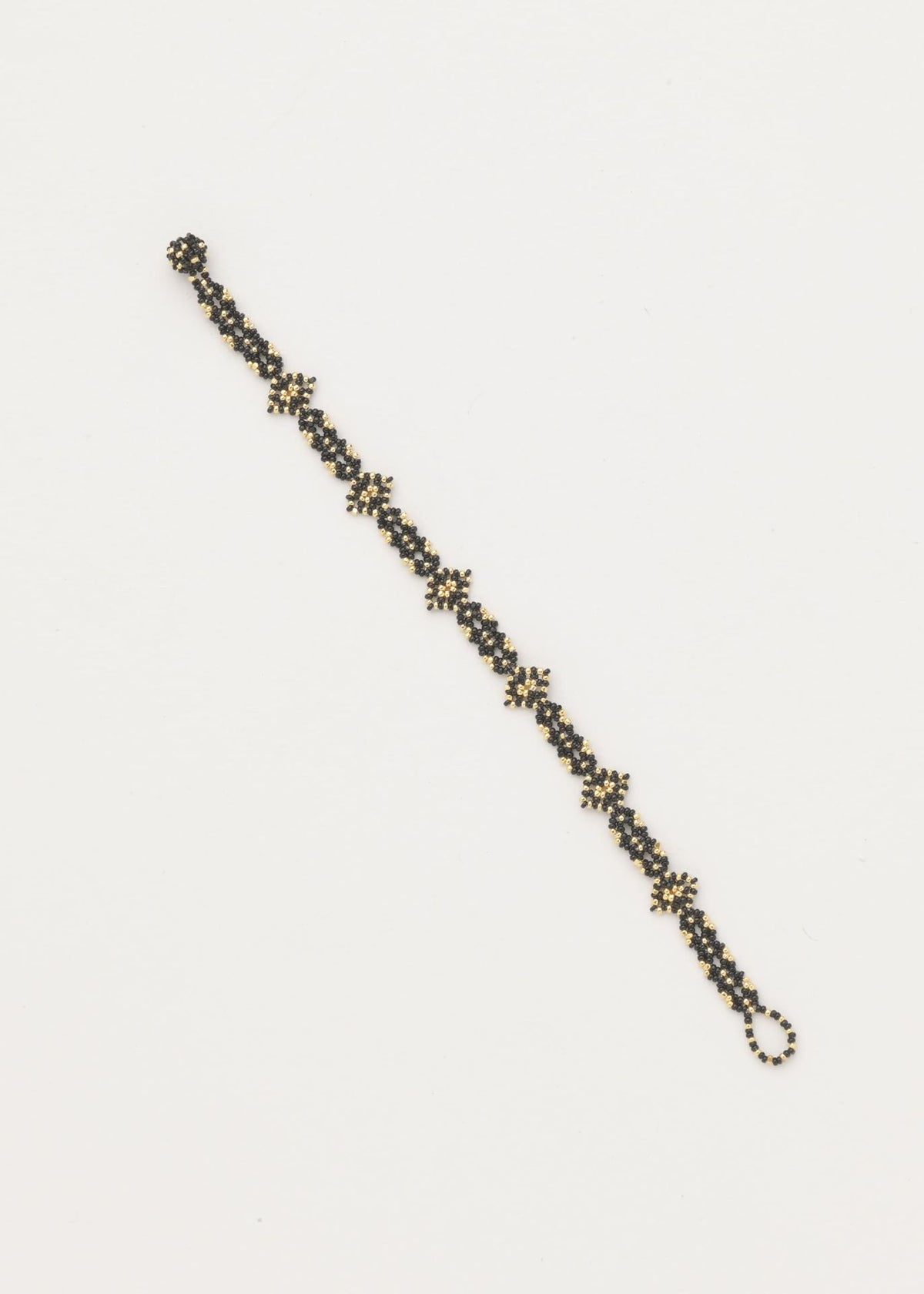 BRAZALETE OJO DE DIOS CADENA ORO NEGRO