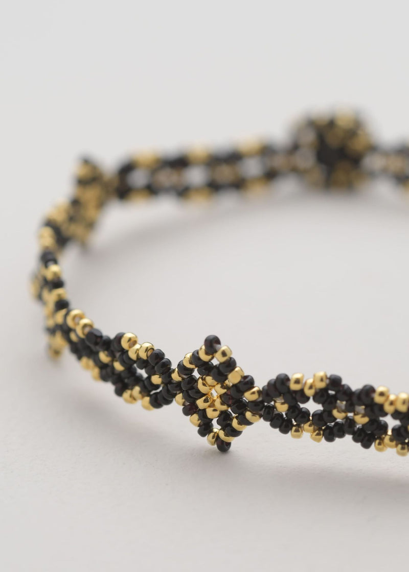 BRAZALETE OJO DE DIOS CADENA ORO NEGRO