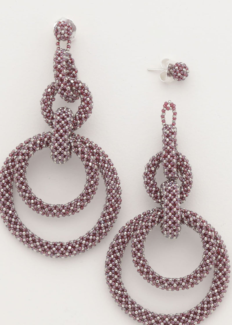 ARETES CINCO AROS CADENA PLATINO TG GARNET LUSTRE