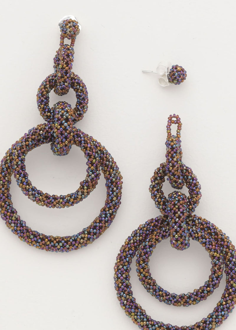 ARETES CINCO AROS CADENA TOPAZ TORNASOL
