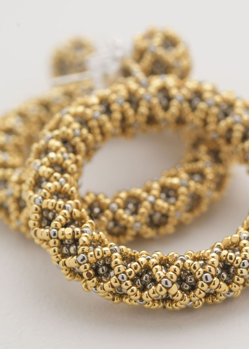 ARETES UN ARO NAWI ORO PLATINO